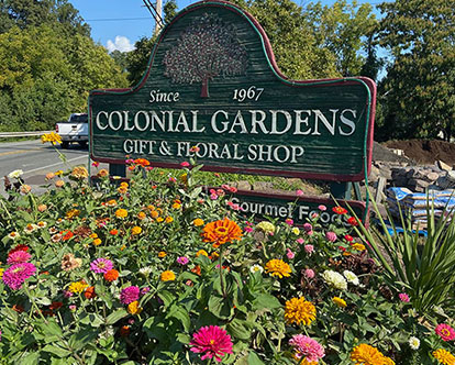 Colonial Gardens sign