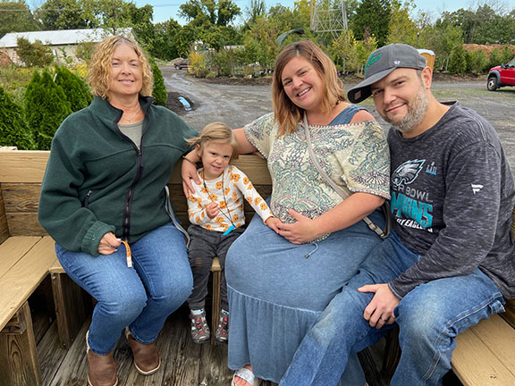 family on daytime hayride