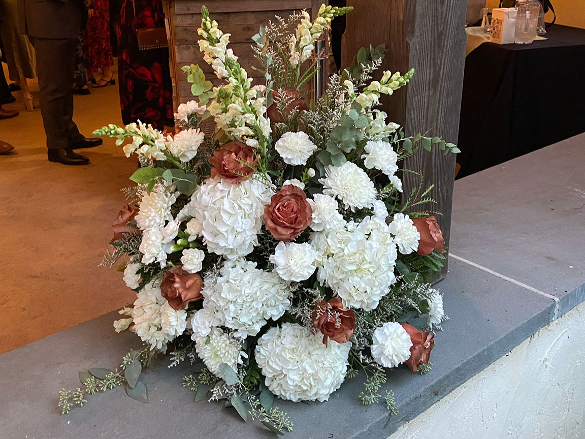 Wedding reception floral arrangement.