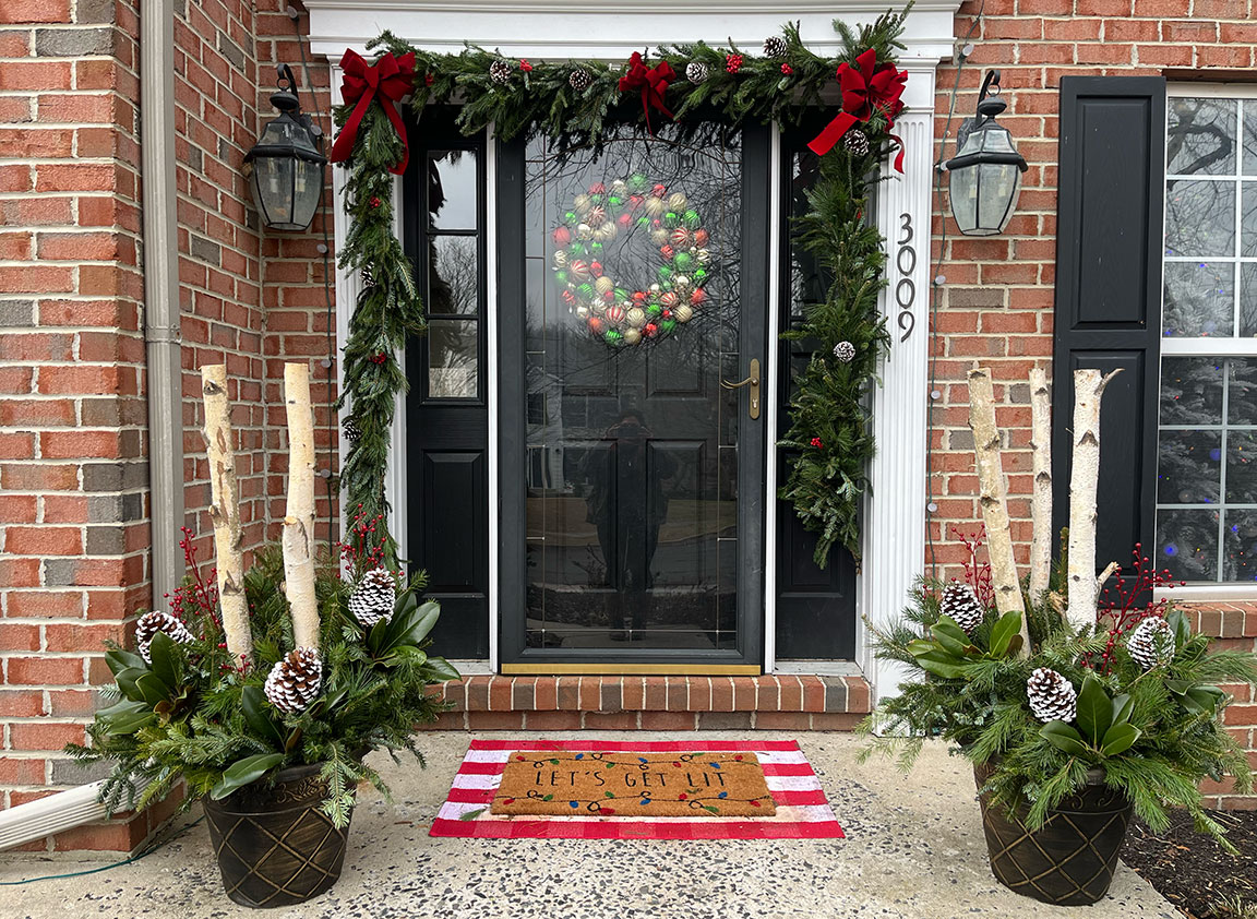 Deluxe Christmas porch decorations.